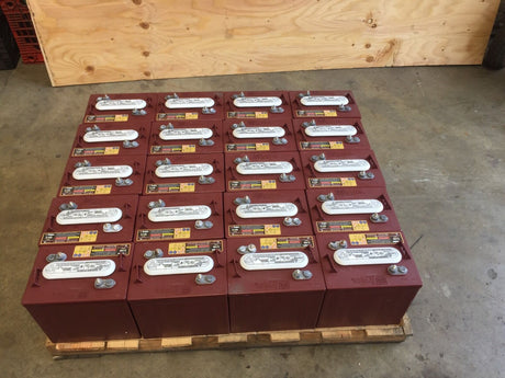 A pallet of 6 volt Trojan deep cycle t105 battery gets ready to ship down to Mexico. People living in...